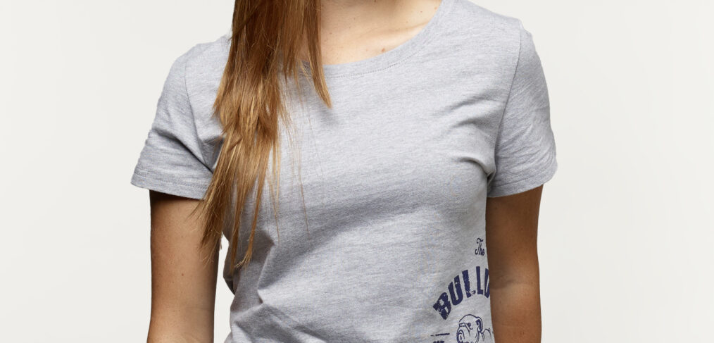 Young woman wearing a Bulldog Factory t-shirt featuring an printed bulldog logo